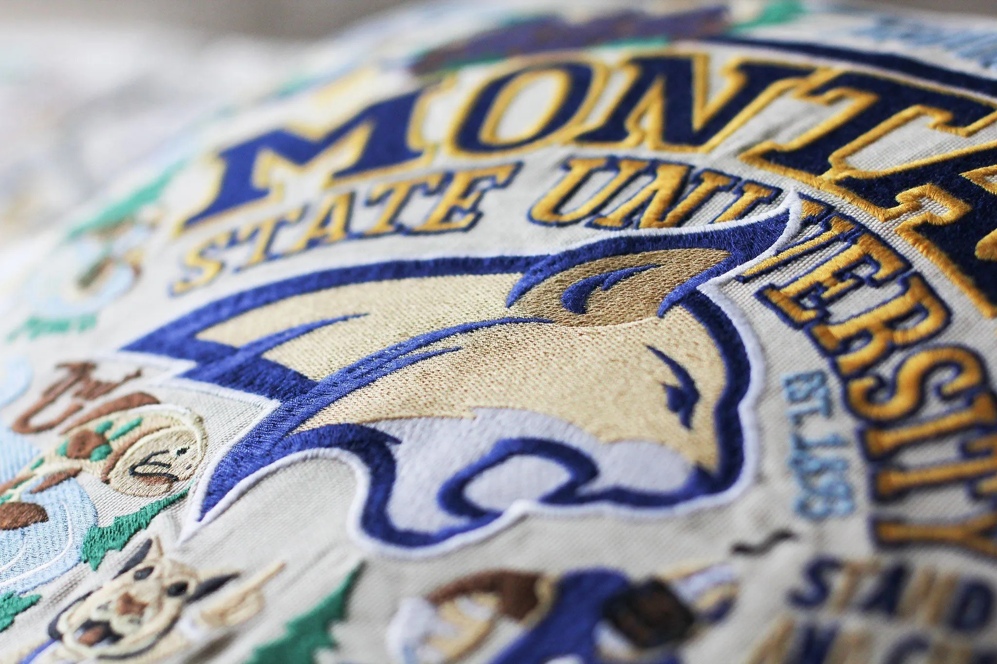 MONTANA STATE UNIVERSITY PILLOW BY CATSTUDIO
