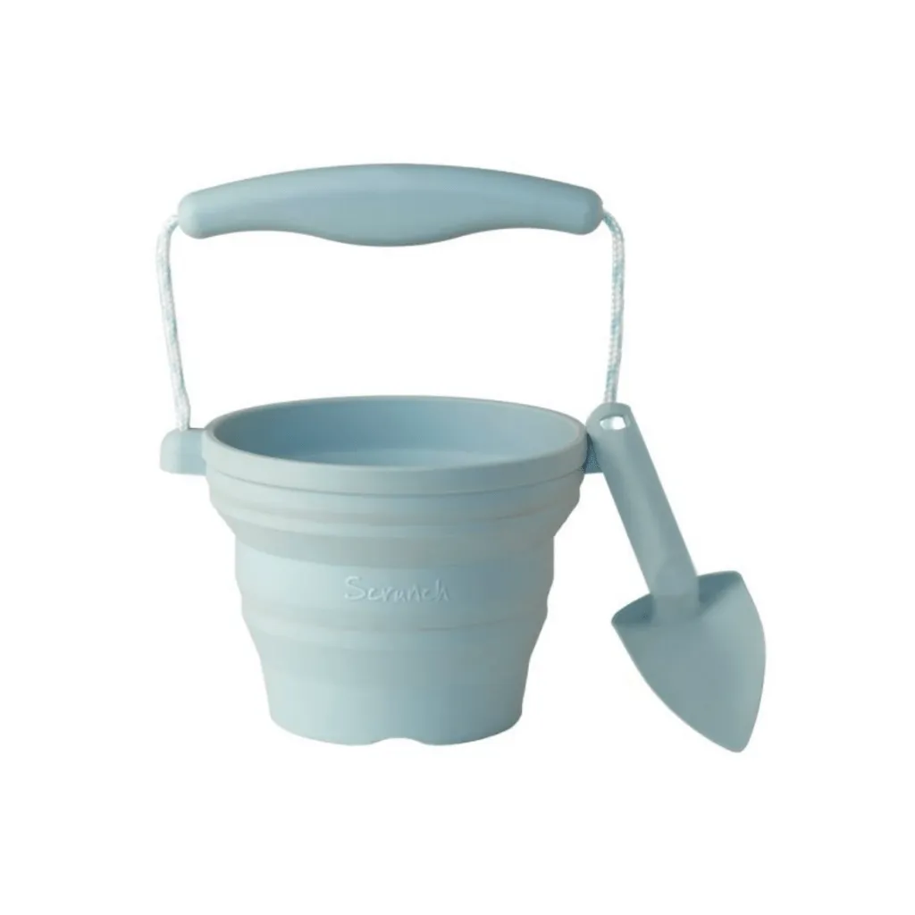 Scrunch seedling pot and trowel