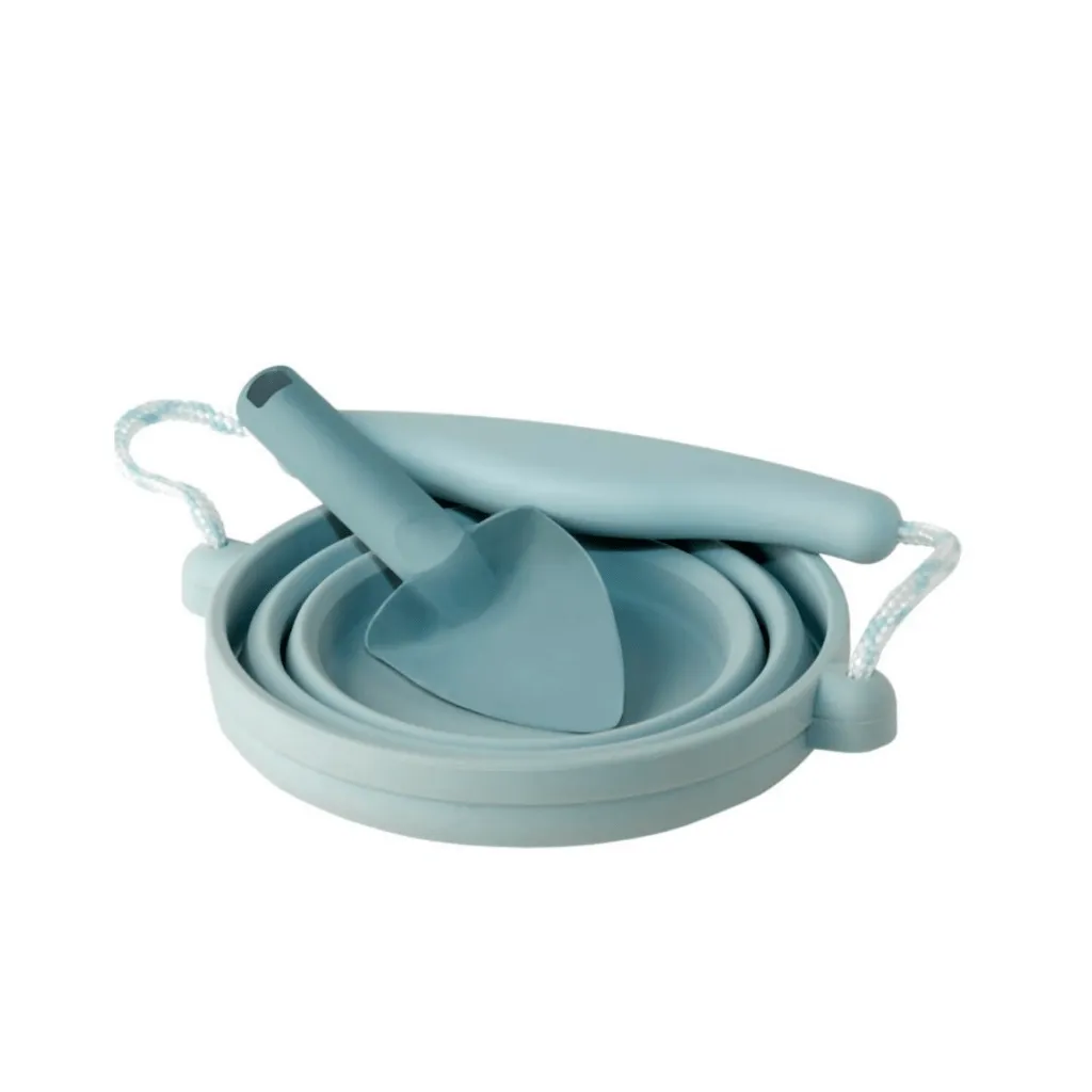 Scrunch seedling pot and trowel