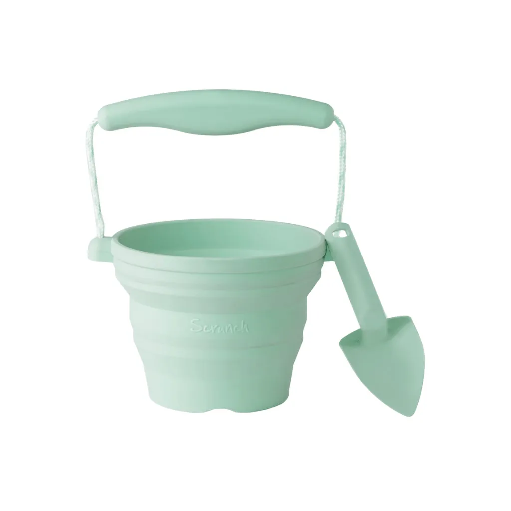 Scrunch seedling pot and trowel