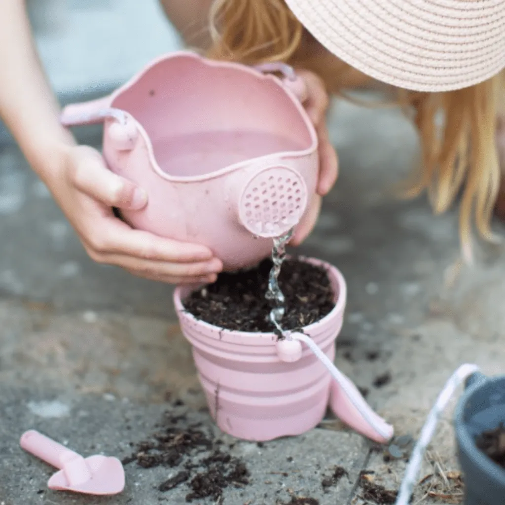 Scrunch seedling pot and trowel