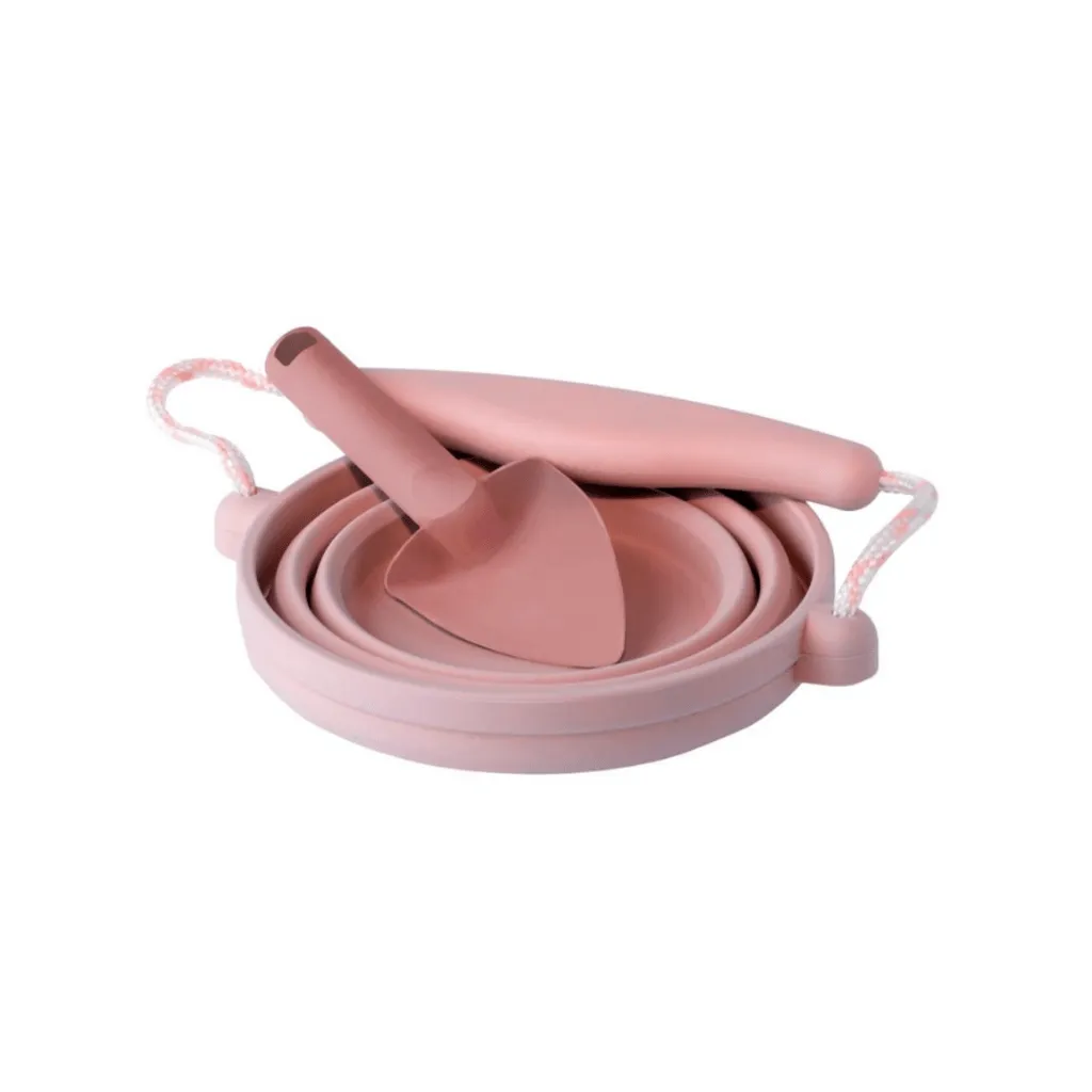 Scrunch seedling pot and trowel