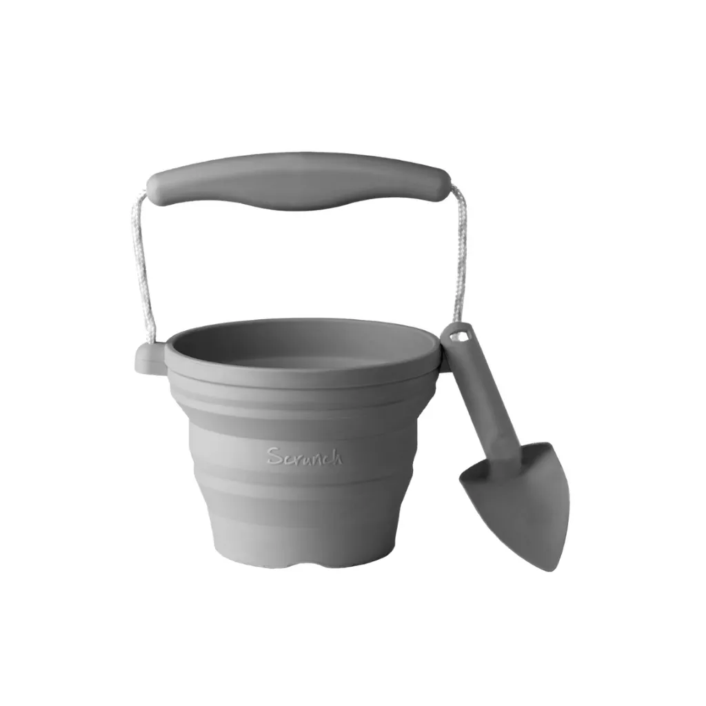 Scrunch seedling pot and trowel